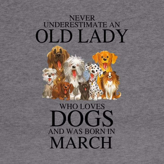 Never Underestimate An Old Lady Who Loves Dogs And Was Born In March by louismcfarland